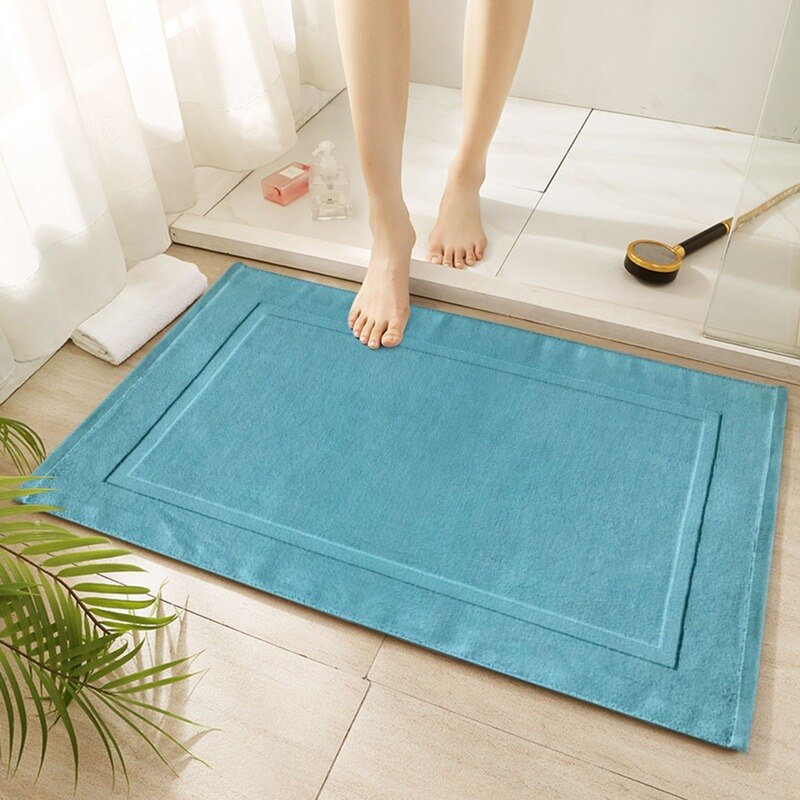 Tapis de bain tendance en bleu turquoise